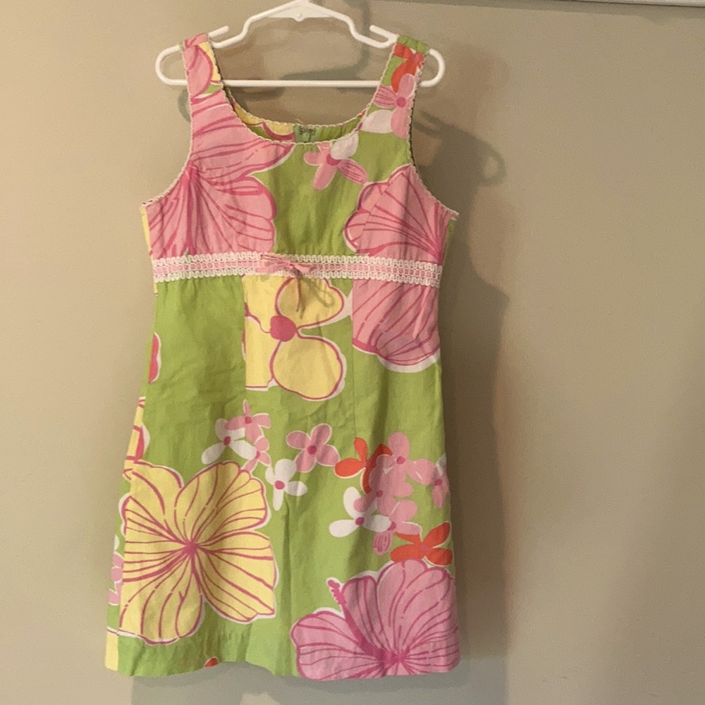 Super cute Lilly Pulitzer pink and green spring dress with a bow in the front